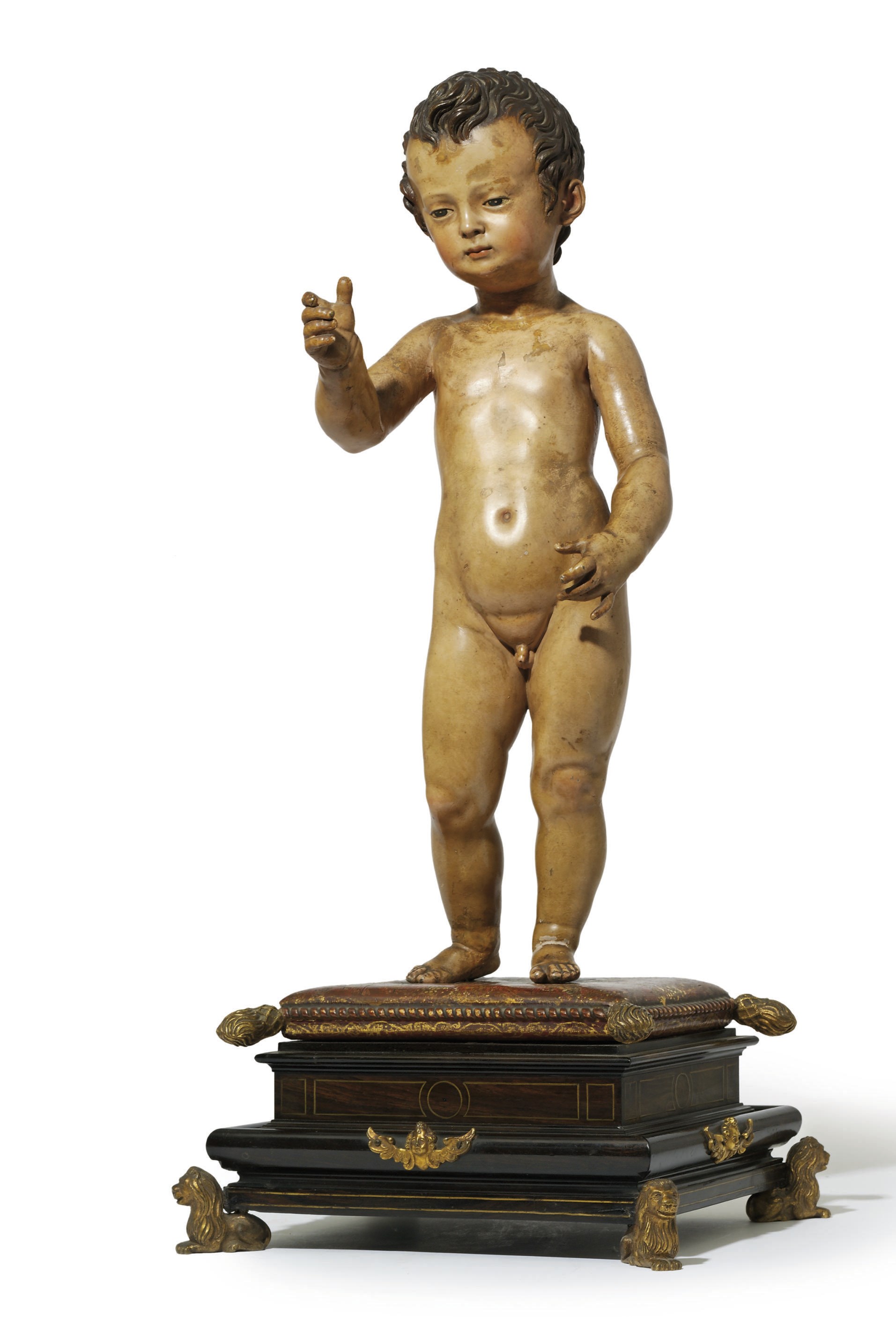 A POLYCHROME LEAD FIGURE OF THE INFANT CHRIST
