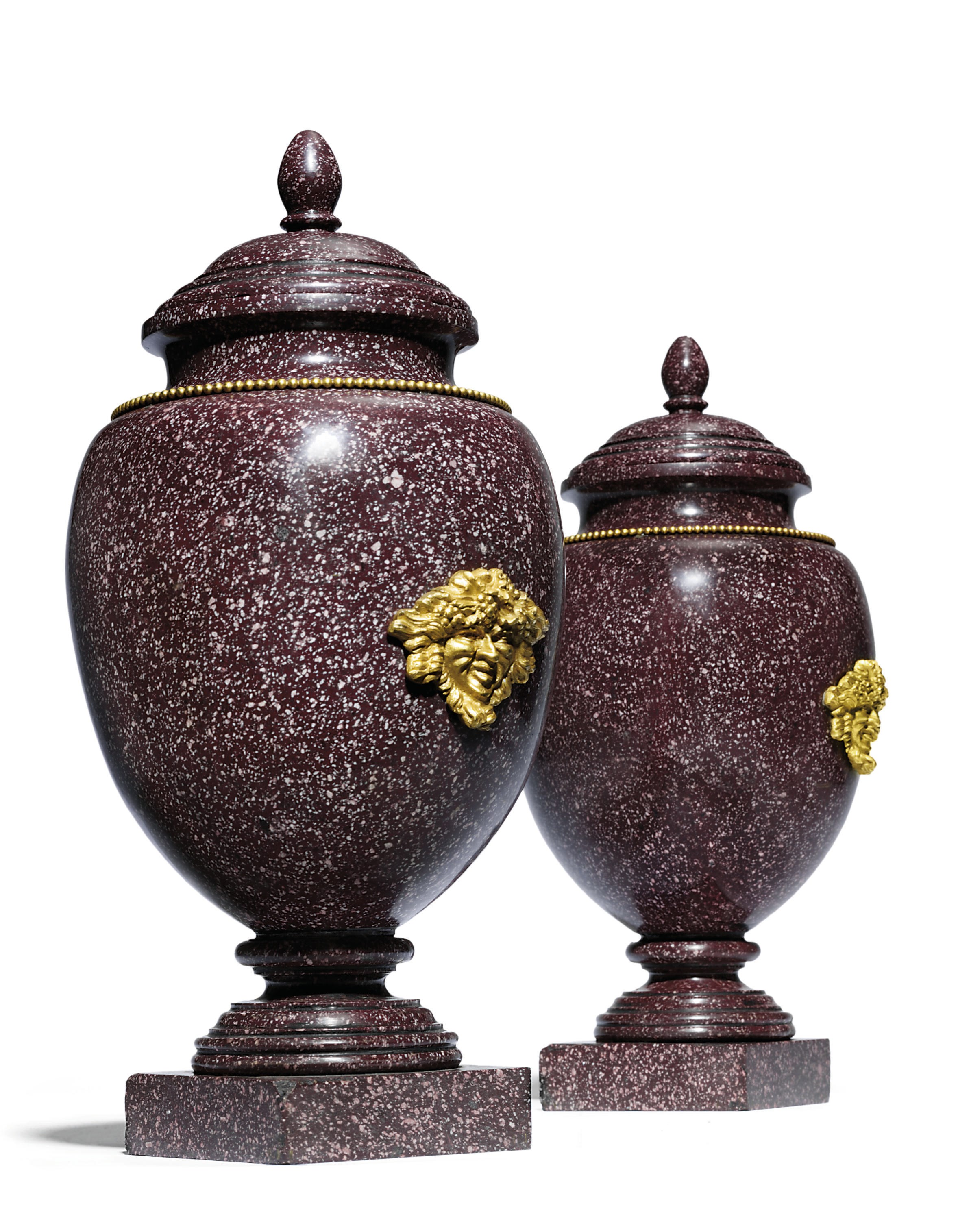 A PAIR OF ORMOLU-MOUNTED PORPHYRY URNS