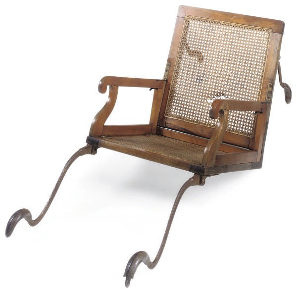 A VICTORIAN CANED BEECH AND FRUITWOOD SEDAN CHAIR
