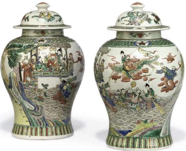 A PAIR OF CHINESE STYLE FAMILLE VERTE VASES AND COVERS