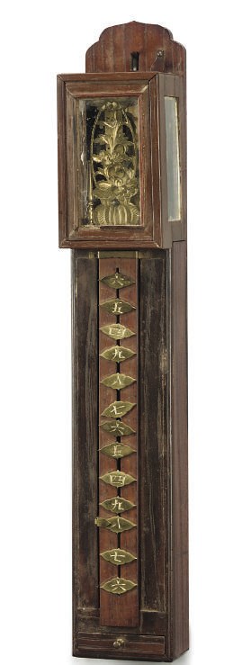 A Japanese hardwood miniature shaku-dokei (pillar clock)