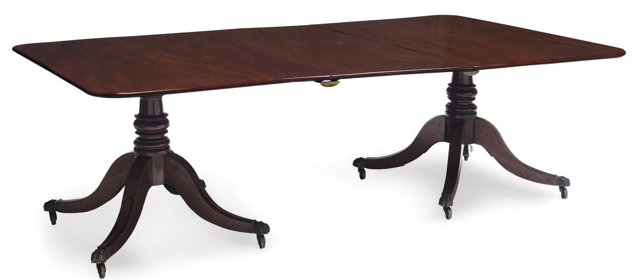 A MAHOGANY TWIN PEDESTAL DINING TABLE
