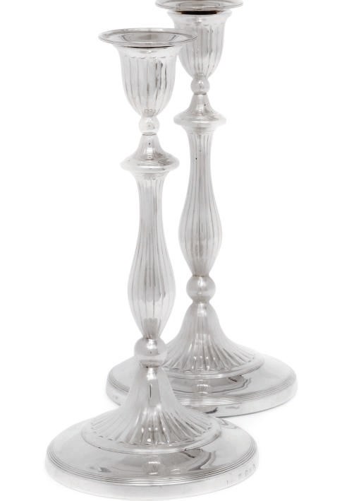 A PAIR OF GEORGE III SILVER CANDLESTICKS