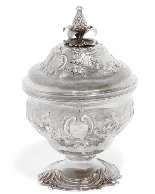 AN EARLY GEORGE III SILVER MIXING BOWL AND COVER