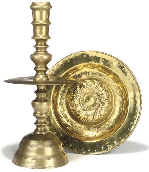 A LARGE DUTCH EAST INDIES BRASS CANDLESTICK