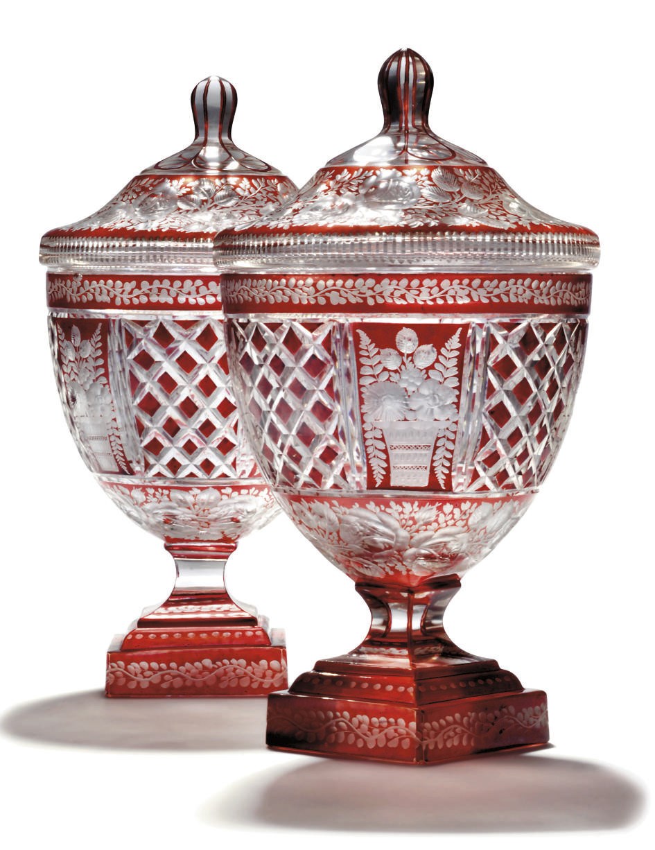 A PAIR OF CONTINENTAL RUBY-STAINED AND CLEAR GLASS VASES AND COVERS