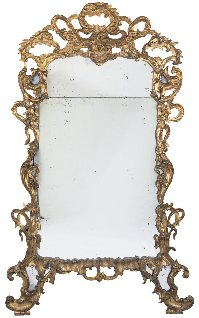 A SOUTH EUROPEAN GILTWOOD MIRROR