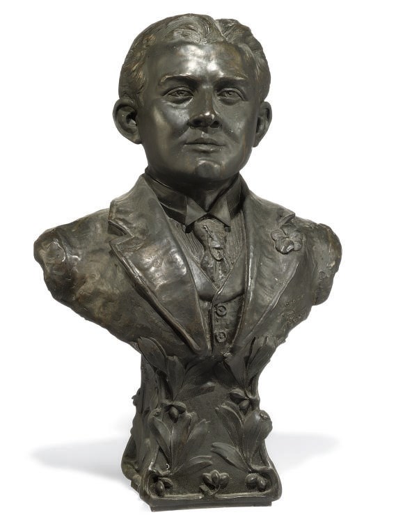 A FRENCH BRONZE BUST OF A MAN