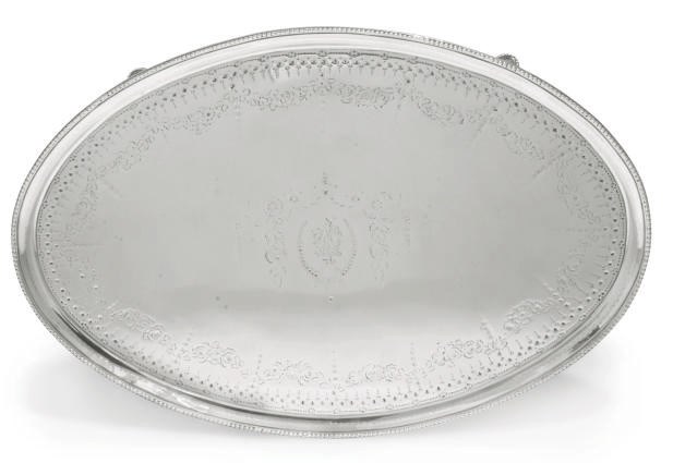 A GEORGE III OVAL SILVER SALVER