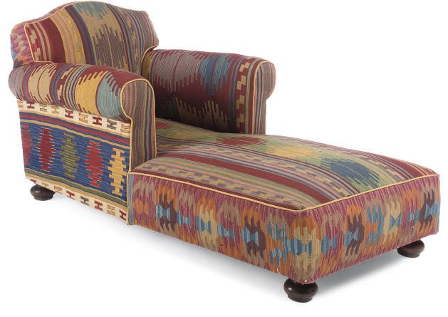 A KILIM UPHOLSTERED DAYBED