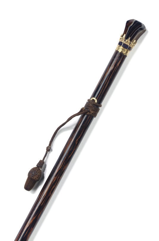 AN AGATE, ENAMEL AND GOLD MOUNTED PALM-WOOD WALKING CANE
