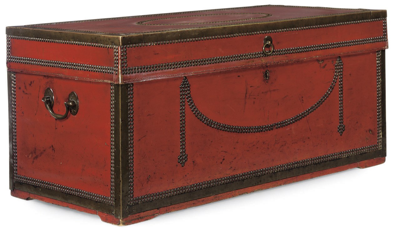 A CHINESE-EXPORT BRASS MOUNTED LEATHER LINED TRAVEL TRUNK