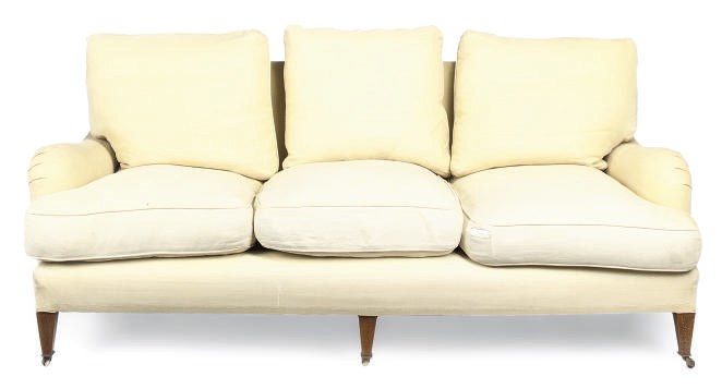 A YELLOW LINEN UPHOLSTERED SOFA