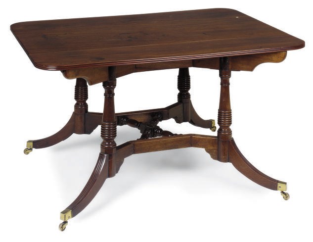 A GEORGE III MAHOGANY CUMBERLAND-ACTION DINING TABLE