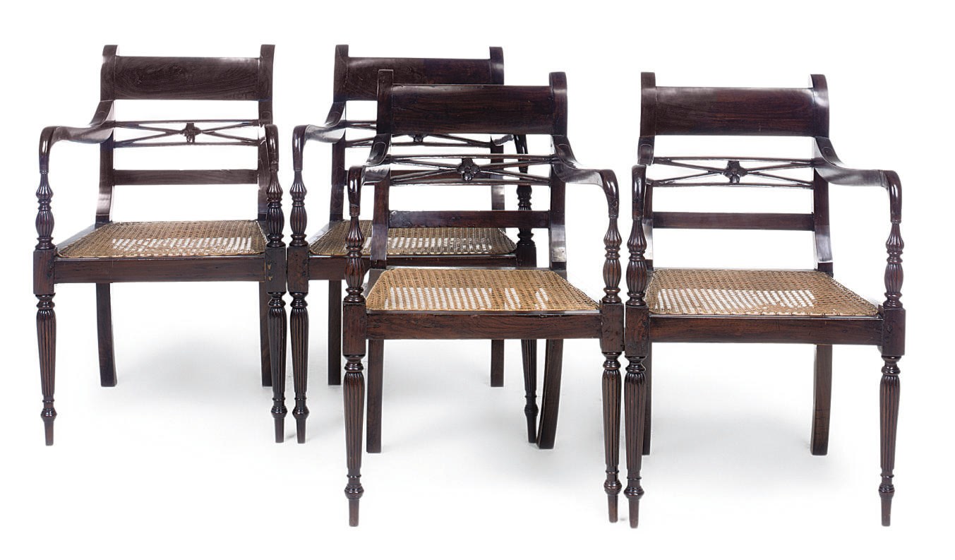 A SET OF FOUR ANGLO-INDIAN ROSEWOOD ARMCHAIRS