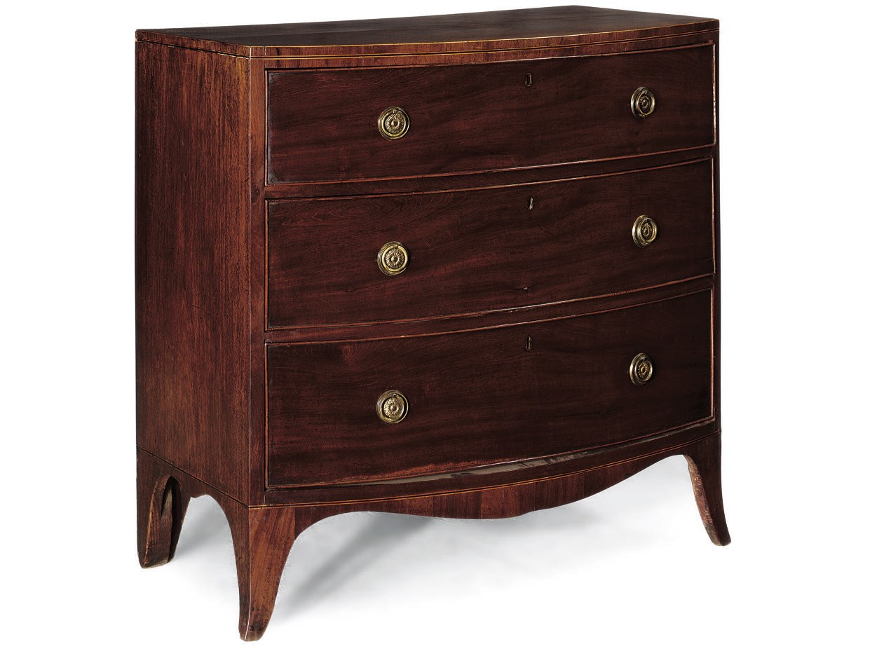 A REGENCY MAHOGANY AND LINE INLAID BOWFRONT CHEST