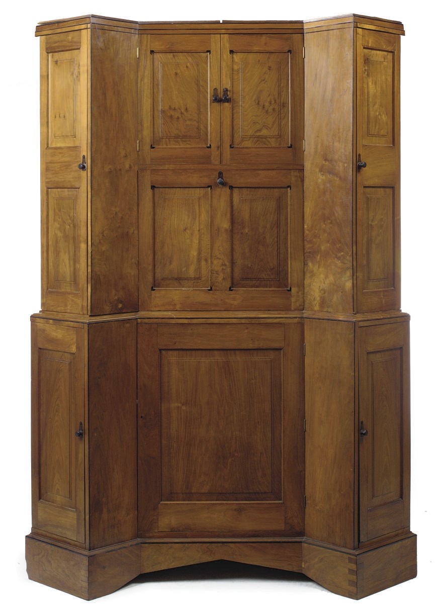 AN EDWARD BARNSLEY WALNUT CORNER CABINET