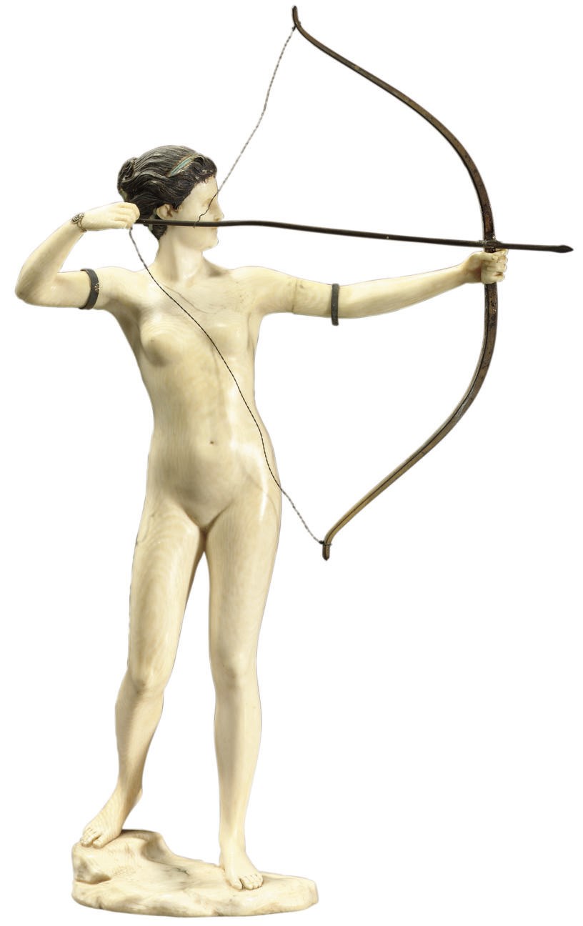 THE ARCHER, A CARVED IVORY FIGURE