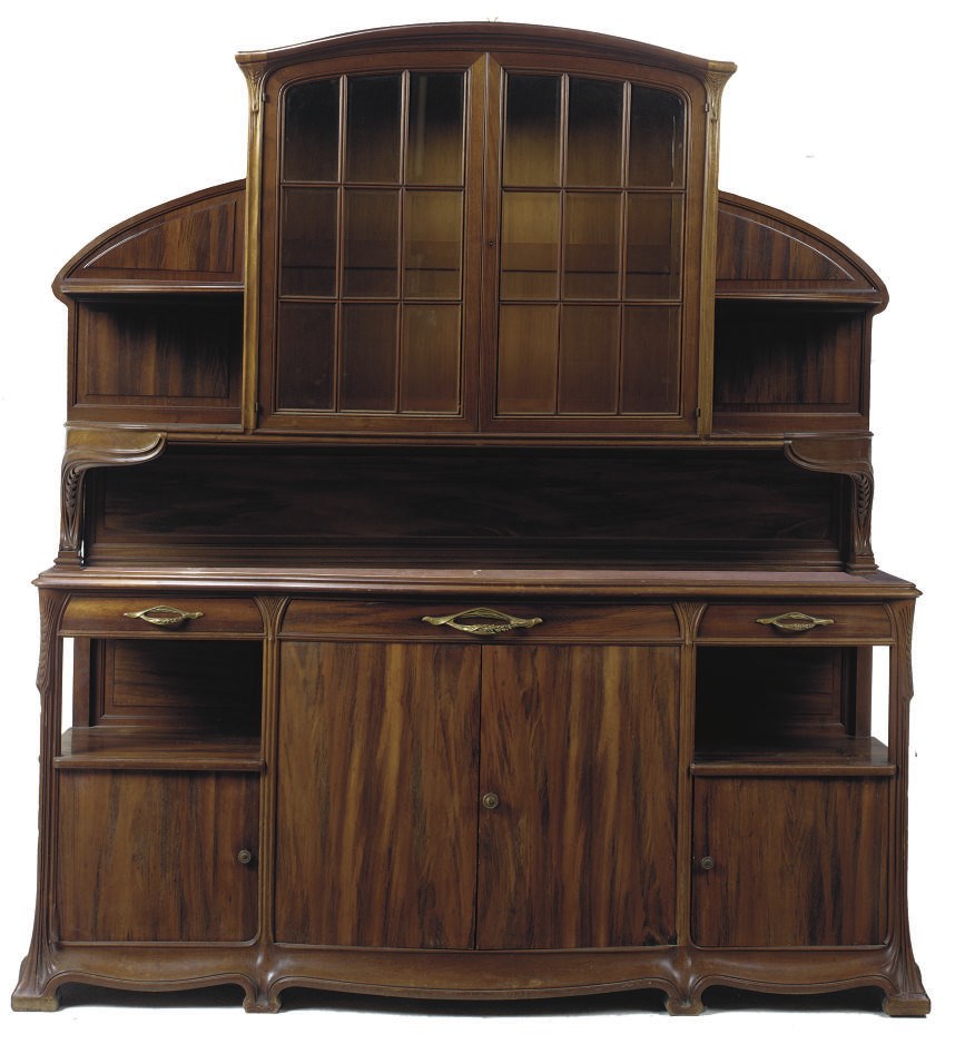 EPIS DE BLÉ, A LOUIS MAJORELLE LARGE CARVED WALNUT AND GLAZED BUFFET