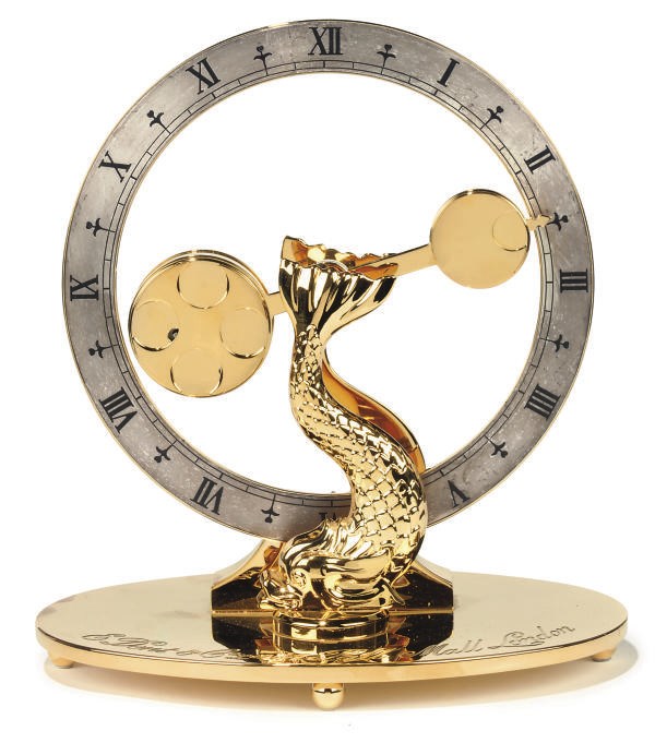 An English brass 'mysterious circulator' timepiece