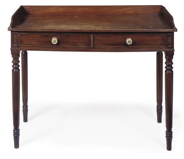 A GEORGE IV MAHOGANY WRITING TABLE