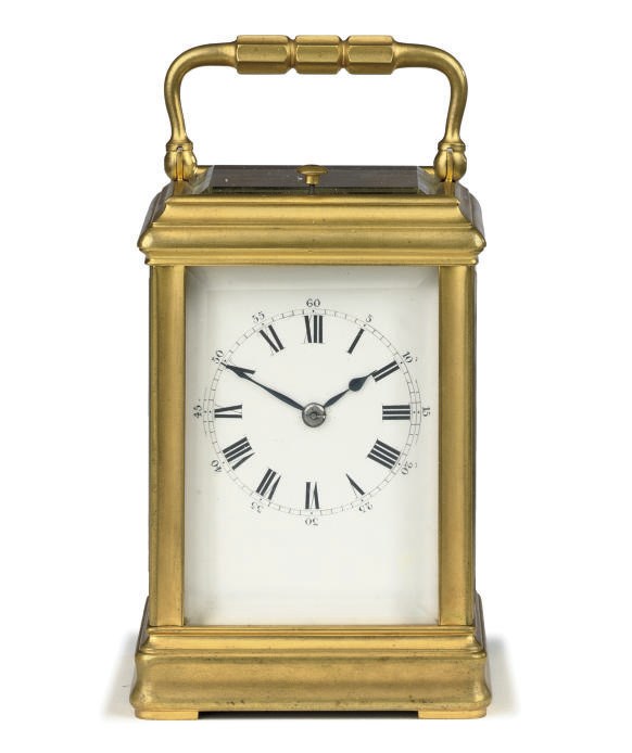 A French brass petite sonnerie eight day carriage clock