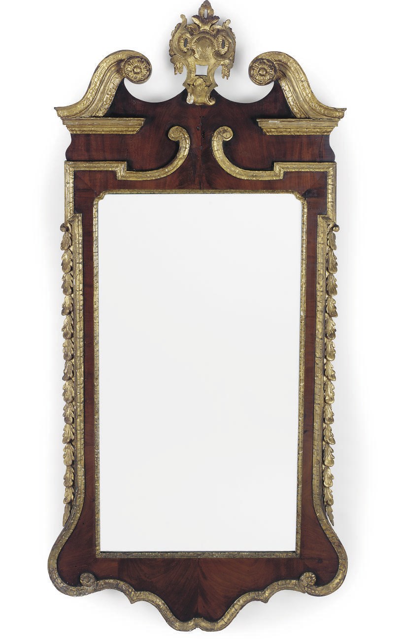 A MAHOGANY AND PARCEL-GILT MIRROR