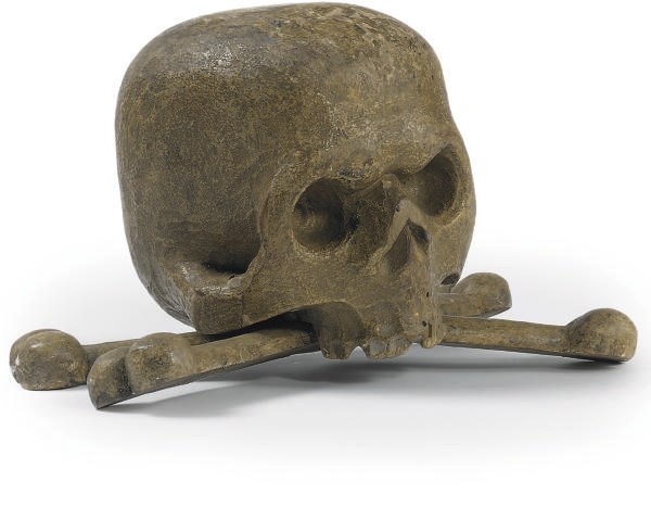 A NEAPOLITAN POLYCHROME CARVED WOOD MODEL OF A HUMAN SKULL