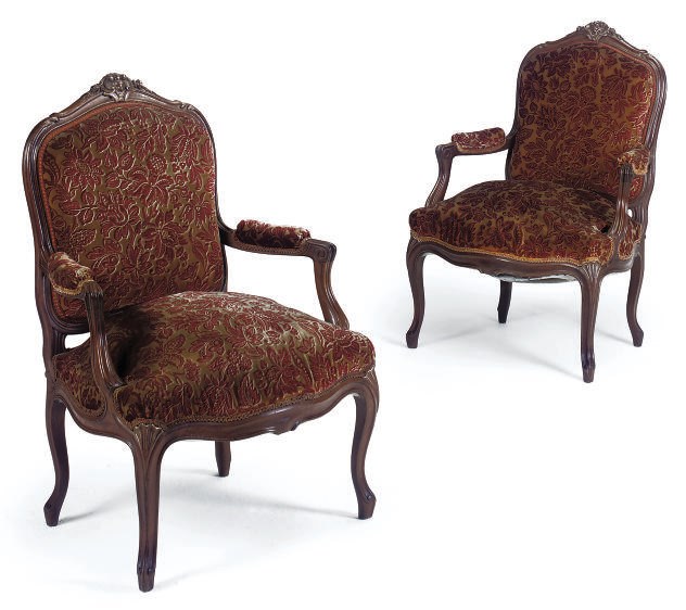 A PAIR OF NORTH EUROPEAN WALNUT FAUTEUIL'S