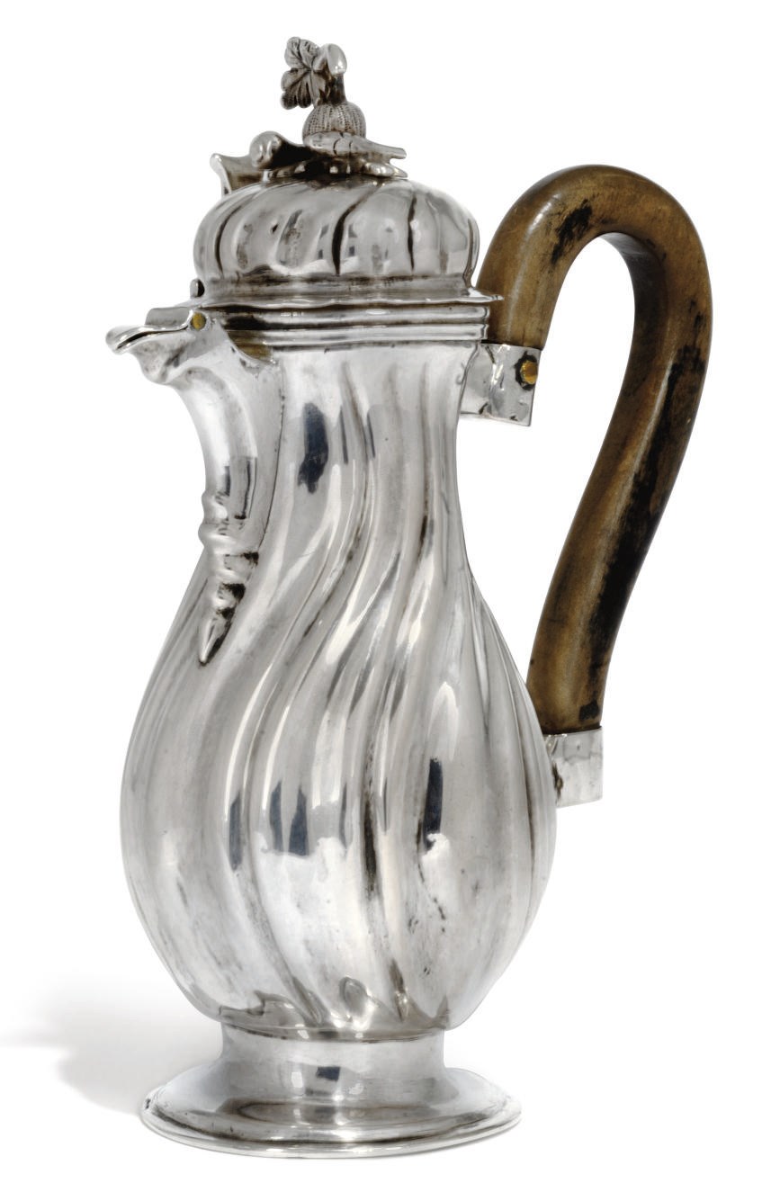 A GERMAN SILVER HOT MILK JUG
