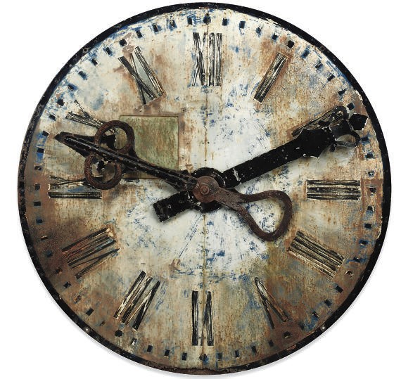 A LARGE NORTH EUROPEAN IRON CLOCK FACE