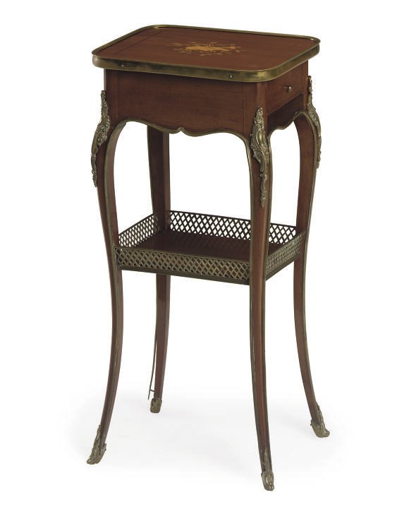 A FRENCH GILT METAL MOUNTED MAHOGANY TABLE AMBULANTE