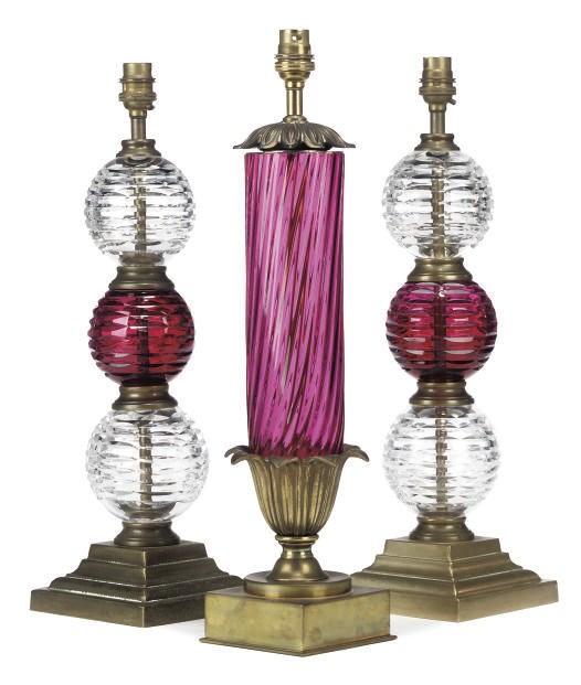 A PAIR OF GLASS AND BRASS TABLE LAMPS