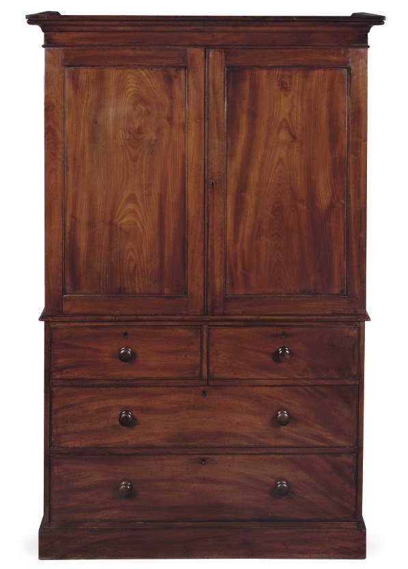AN EARLY VICTORIAN MAHOGANY LINEN PRESS
