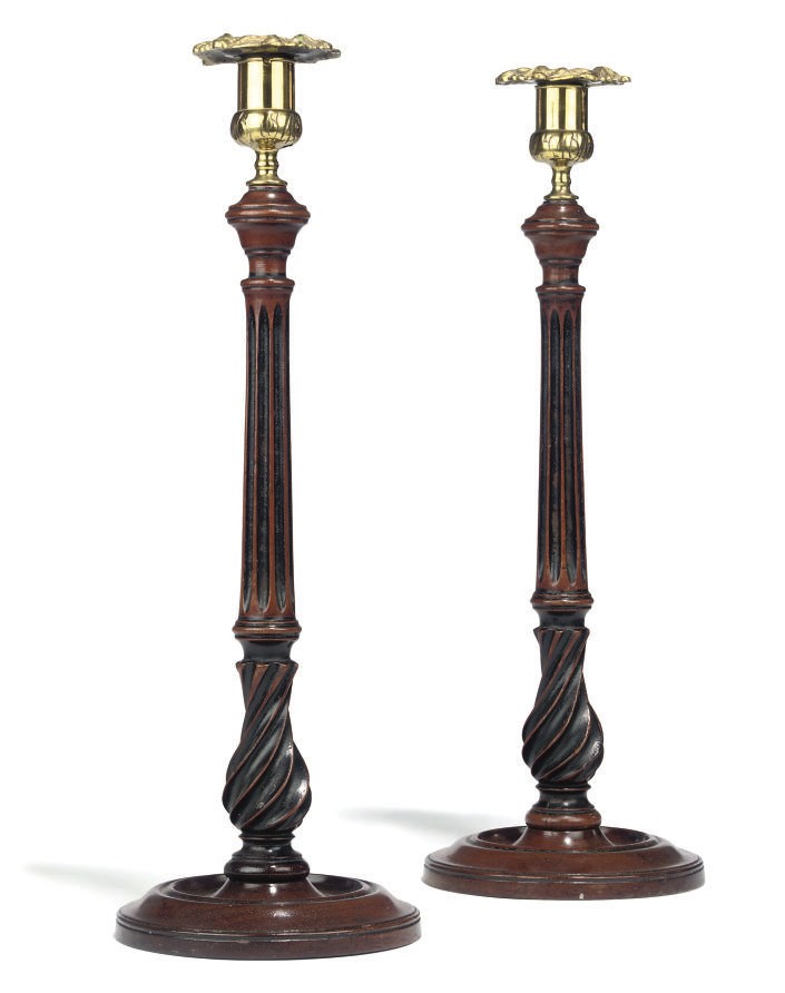 A PAIR OF GEORGE III MAHOGANY CANDLESTICKS