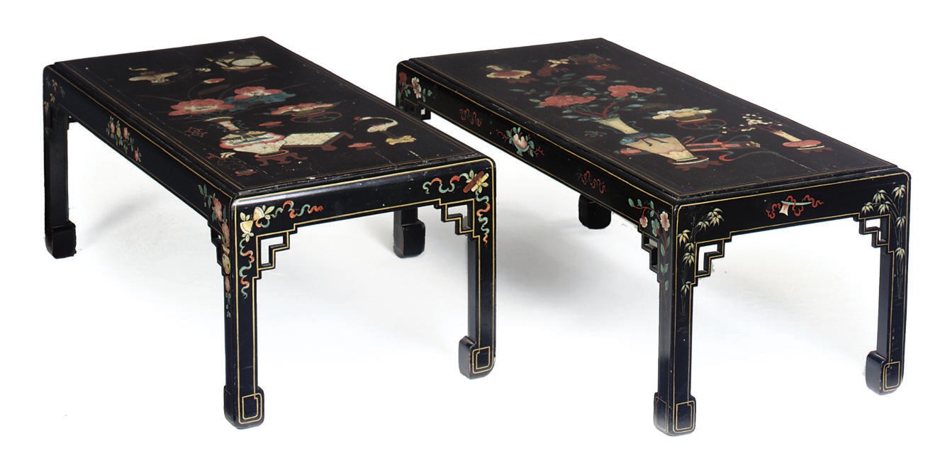 A PAIR OF BLACK PAINTED AND DECORATED LOW TABLES