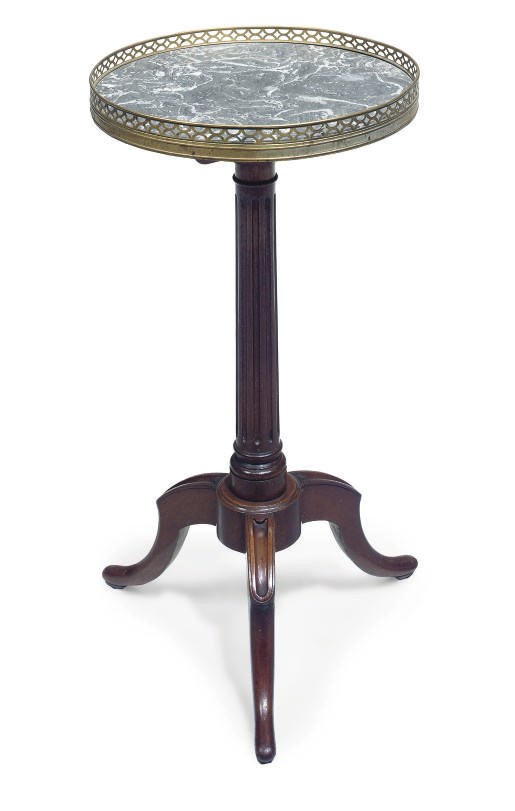 A FRENCH GILT METAL MOUNTED MAHOGANY GUERIDON