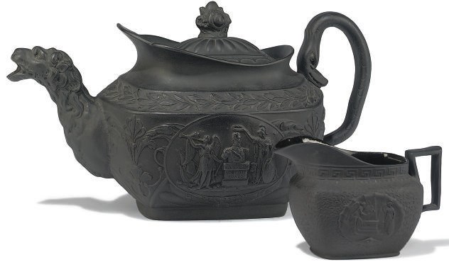 A BLACK BASALT COMMEMORATIVE TEAPOT AND MILK JUG