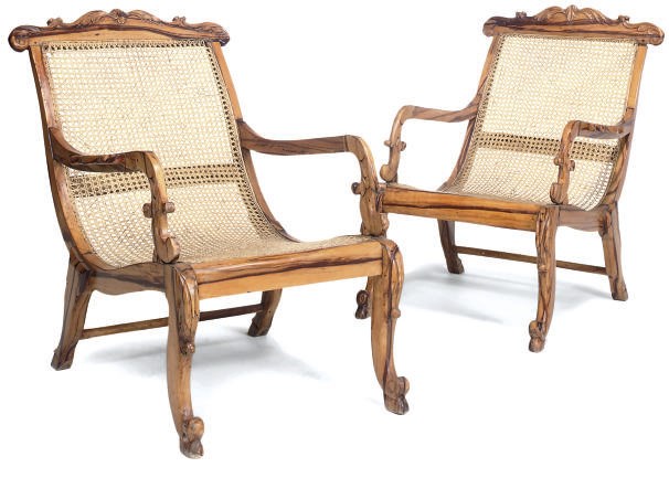 A PAIR OF ANGLO CEYLONESE HARDWOOD ARMCHAIRS