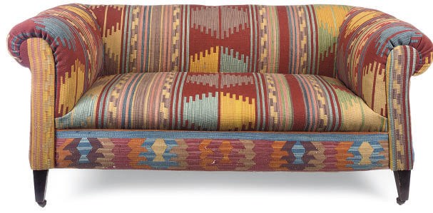 A LATE VICTORIAN KILIM UPHOLSTERED SOFA