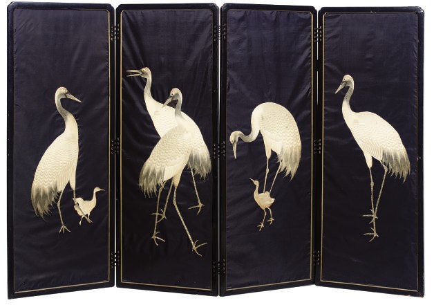 A JAPANESE SILKWORK AND BLACK PAINTED FOUR FOLD SCREEN