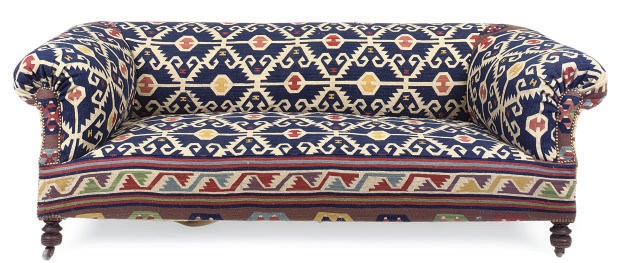 A LATE VICTORIAN KILIM UPHOLSTERED CHESTERFIELD SOFA