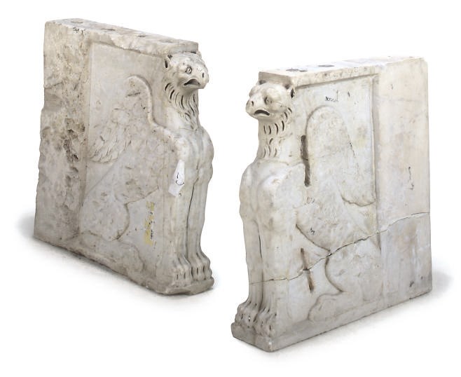 A PAIR OF WHITE MARBLE CONSOLE SUPPORTS
