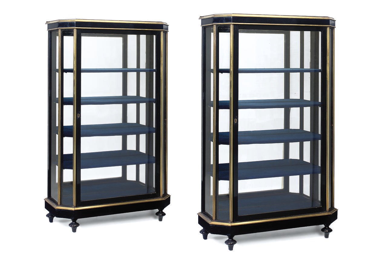 A PAIR OF EBONISED AND BRASS MOUNTED DISPLAY CABINETS