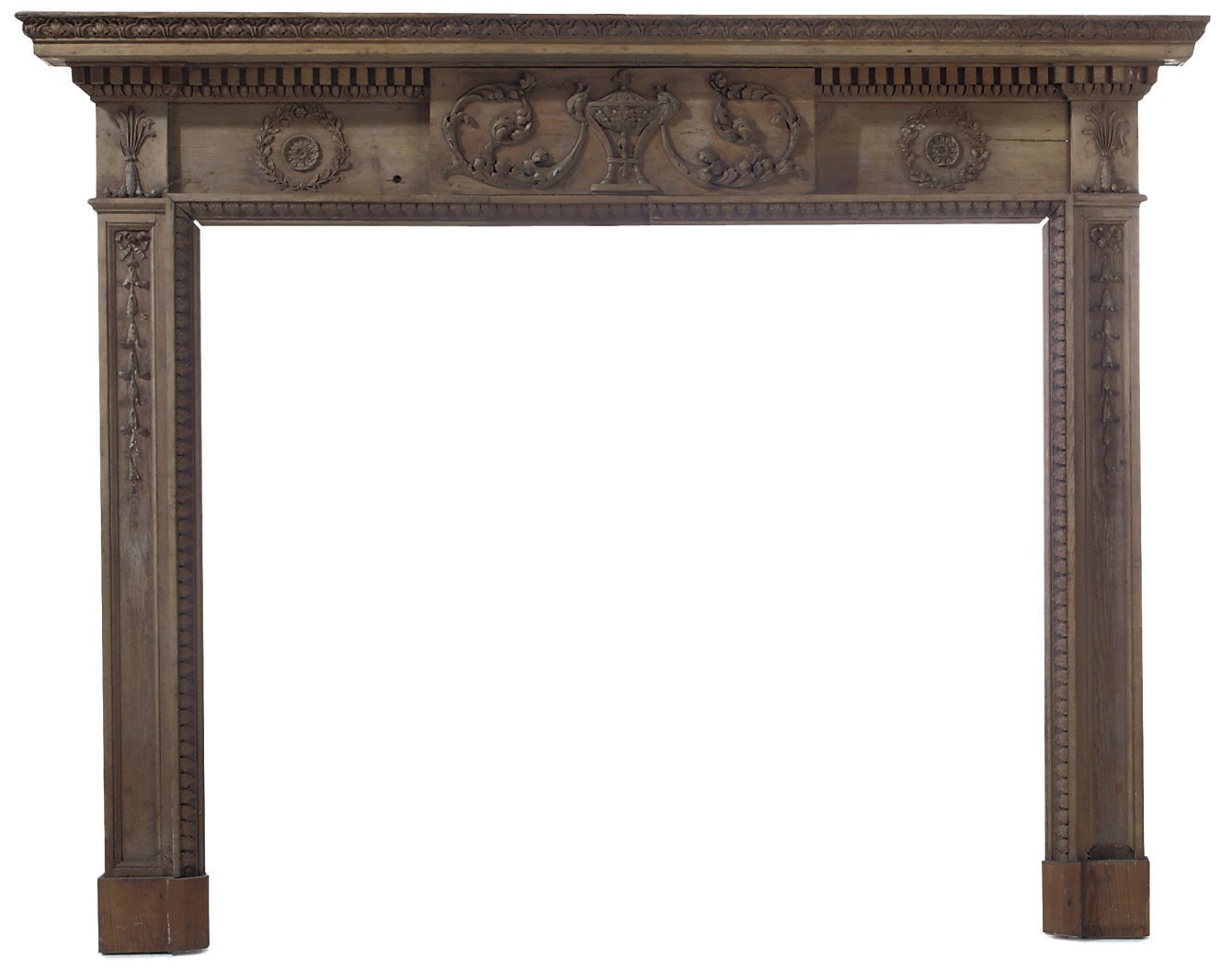 A REGENCY PINE CHIMNEYPIECE