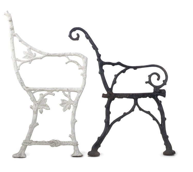 A PAIR OF WHITE-PAINTED CAST-IRON GARDEN BENCH ENDS