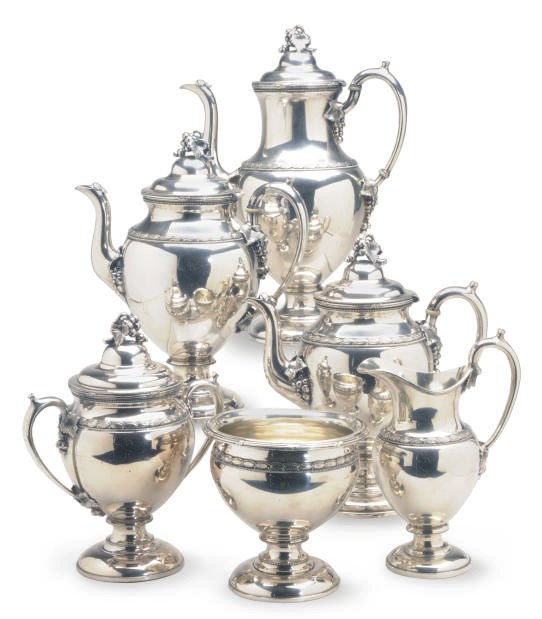 AN AMERICAN SILVER-PLATED SEVEN-PIECE TEA AND COFFEE SERVICE,