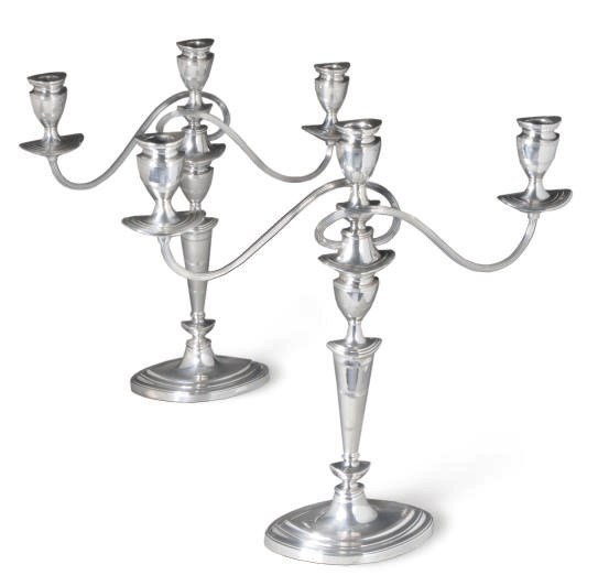 A PAIR OF SILVER-PLATED THREE-LIGHT CANDELABRA,
