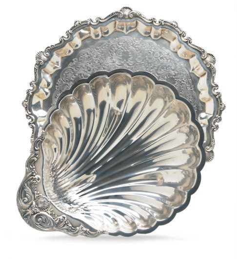 A GROUP OF FOUR SILVER-PLATED SALVERS AND TWO SHELL-SHAPED DISHES,