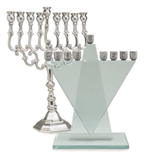 A SILVER-PLATED MENORAH AND A GLASS MENORAH AND A PAIR OF SIMILAR CANDLESTICKS,